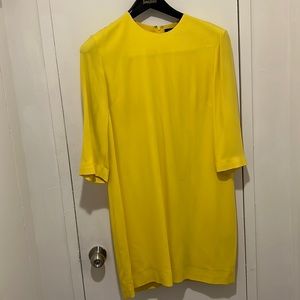 Ralph Lauren women’s dress in great condition. Bright yellow size 12